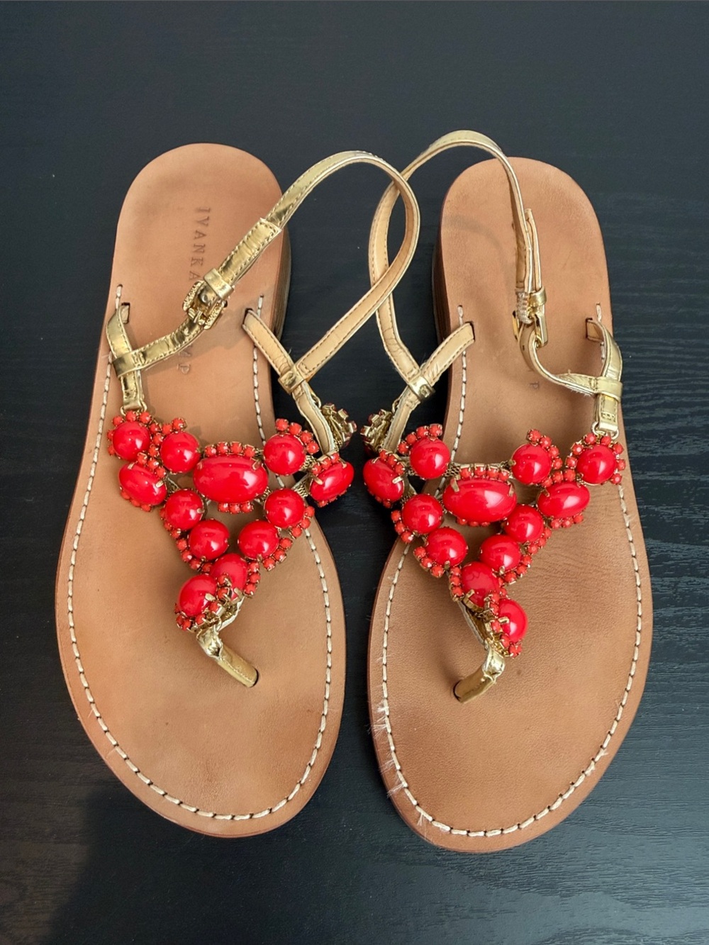 Ivanka Trump Gold T-Strap Sandals with Red Gem Embellishment